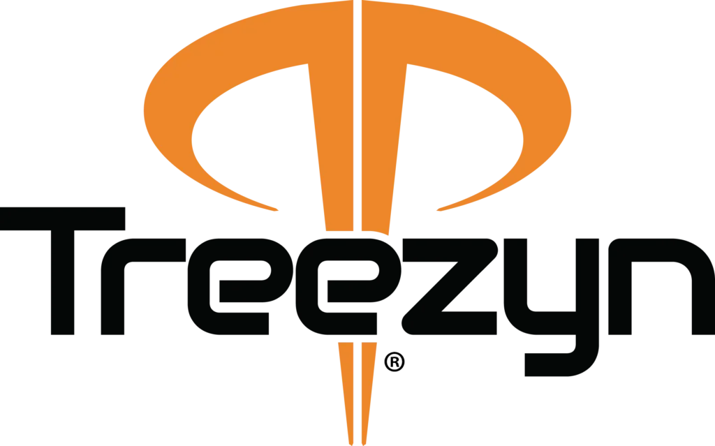 Hunter wearing Treezyn's Early Seezyn camouflage gear, blending seamlessly into a lush, green forest environment.